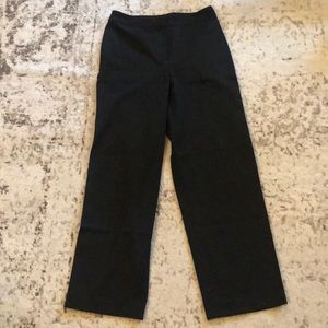 Black trouser pants, mid rise no belt loops.